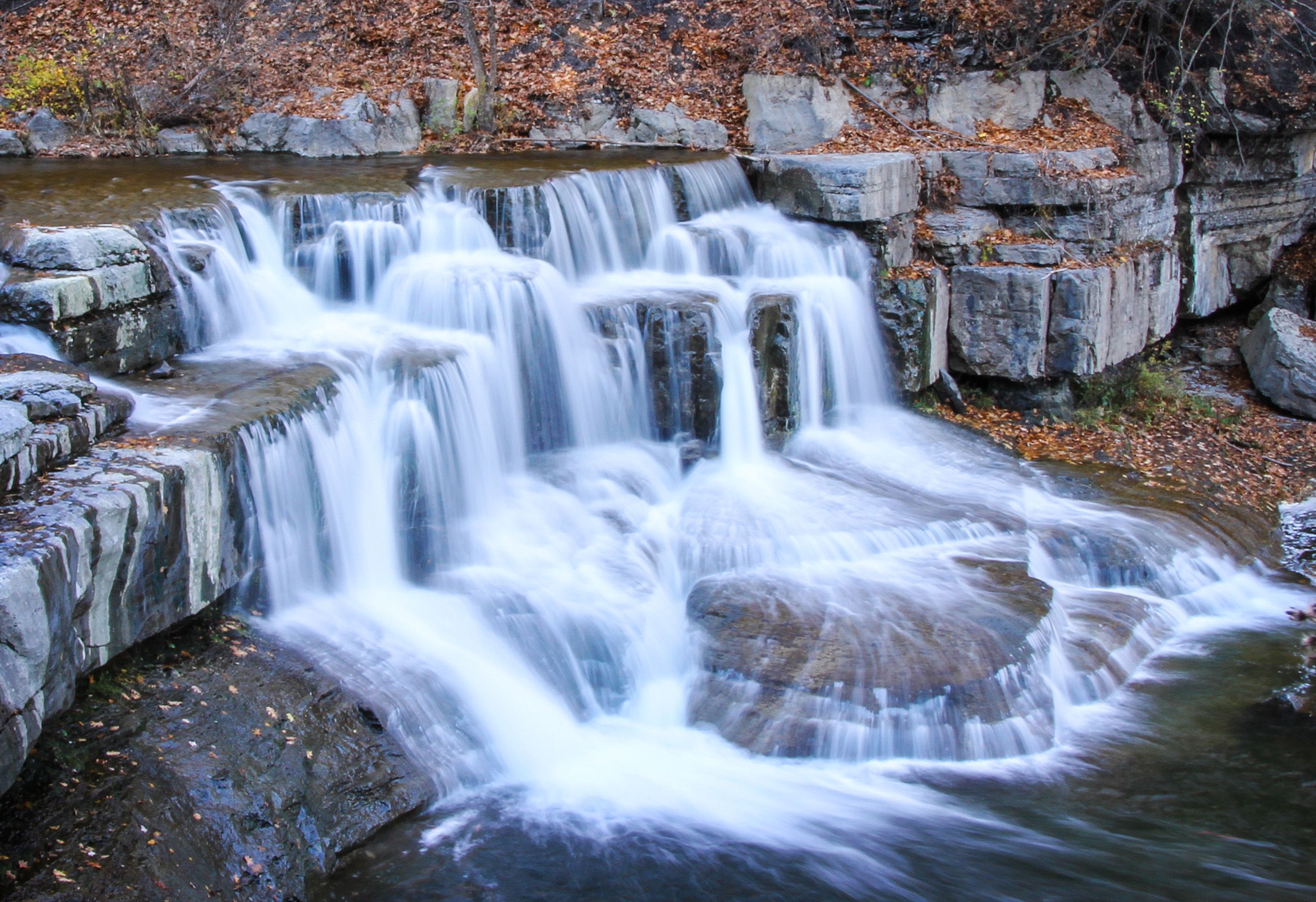 Taughannock Falls from the base of the gorge trail, the full 215-foot drop framed by shale amphitheater walls